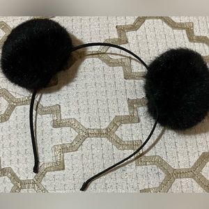 Puffs heyyy!  Cute head band standard sized band with fuzzy balls for any style